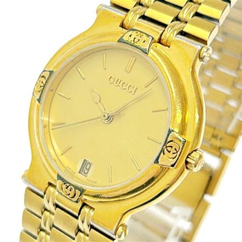 gucci 9200m date black dial gold plated quartz|Gucci .